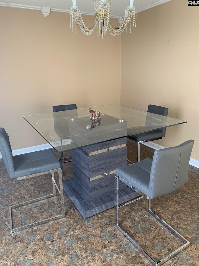 dining area featuring a chandelier and ornamental molding