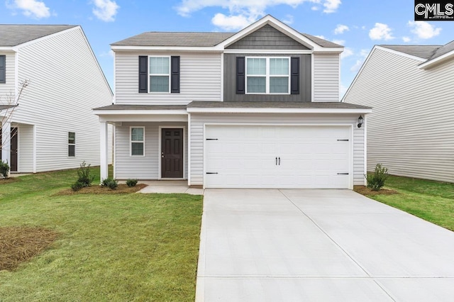 view of front of property featuring a garage and a front lawn