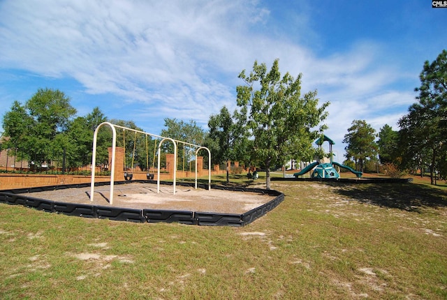 view of jungle gym featuring a yard