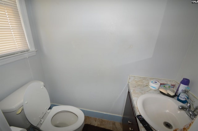 bathroom featuring hardwood / wood-style flooring, vanity, and toilet