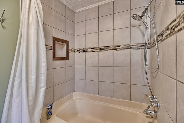 bathroom featuring a textured ceiling and shower / bath combo with shower curtain