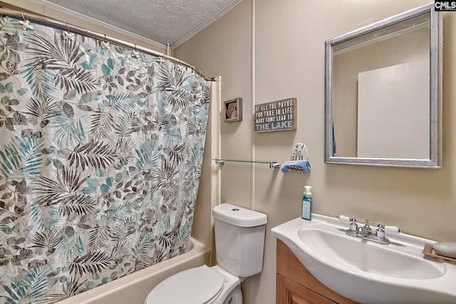 full bathroom featuring vanity, crown molding, toilet, a textured ceiling, and shower / tub combo