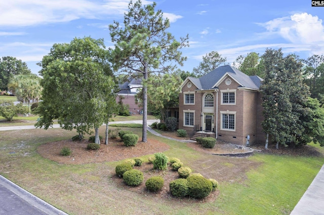 view of front of home with a front lawn