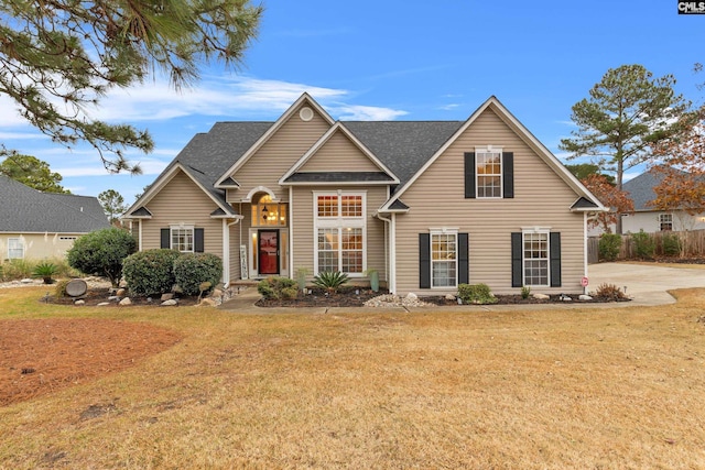 view of front of house with a front lawn