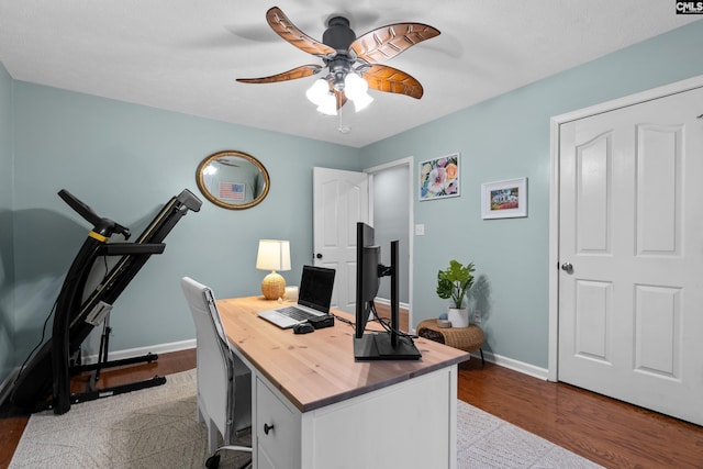 office with ceiling fan and light wood-type flooring