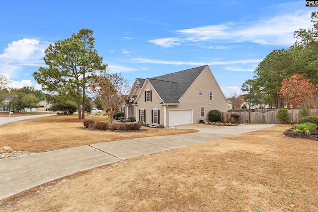 view of property exterior with a lawn and a garage