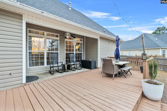 wooden deck with ceiling fan