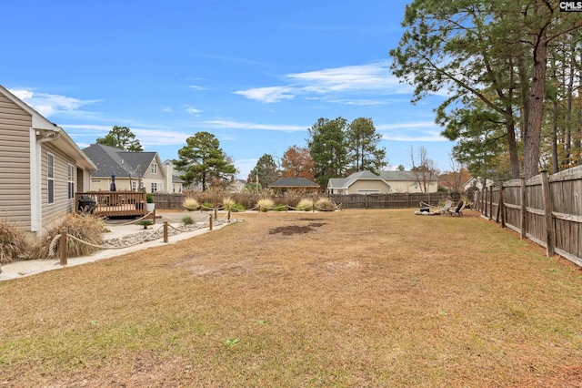 view of yard with a deck