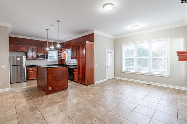 kitchen featuring light tile patterned flooring, crown molding, hanging light fixtures, appliances with stainless steel finishes, and a kitchen island