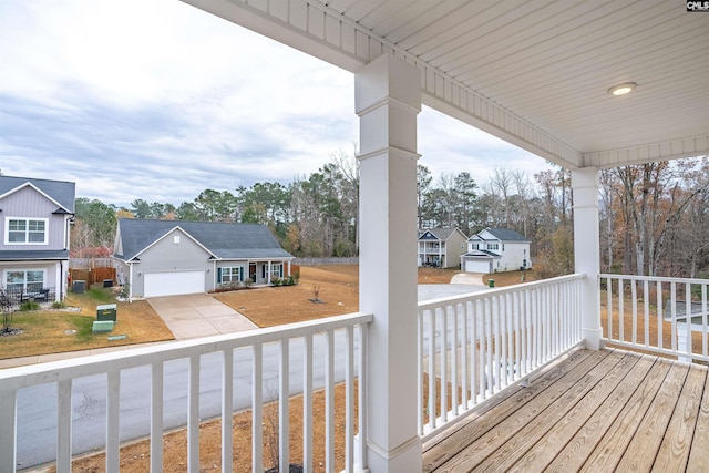 wooden terrace featuring covered porch