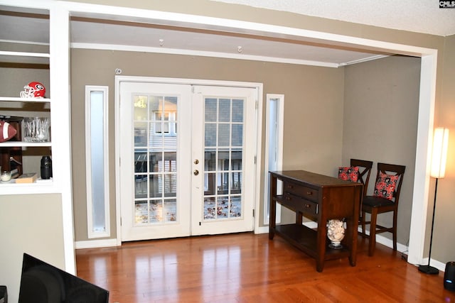 doorway featuring hardwood / wood-style flooring and french doors