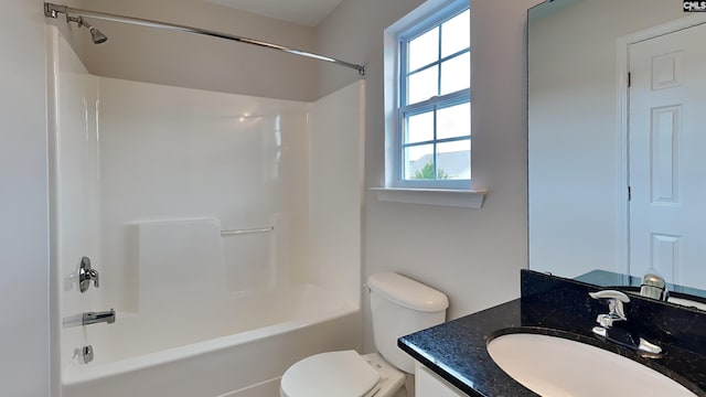 full bathroom featuring vanity, toilet, and tub / shower combination