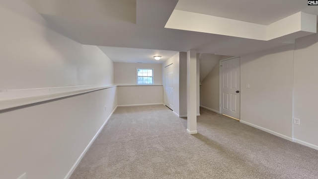 basement with light carpet