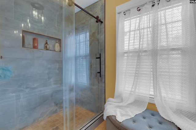 bathroom featuring an enclosed shower