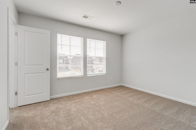 empty room with light carpet