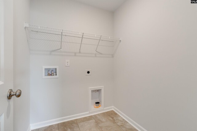 laundry area with electric dryer hookup and washer hookup