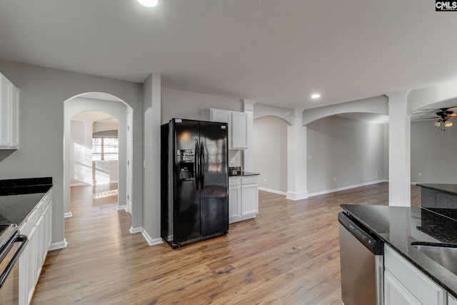 kitchen featuring white cabinets, ceiling fan, light wood-type flooring, and appliances with stainless steel finishes