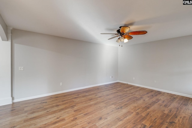 unfurnished room featuring ceiling fan and light wood-type flooring