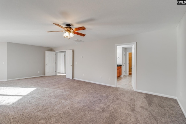 empty room with light carpet and ceiling fan