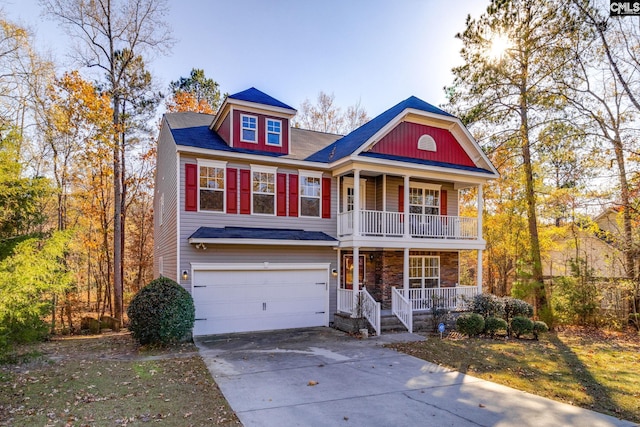 view of front of property featuring a porch and a garage