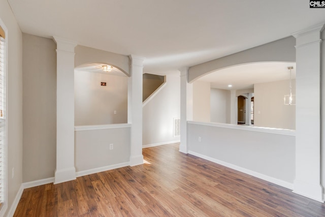 empty room featuring wood-type flooring