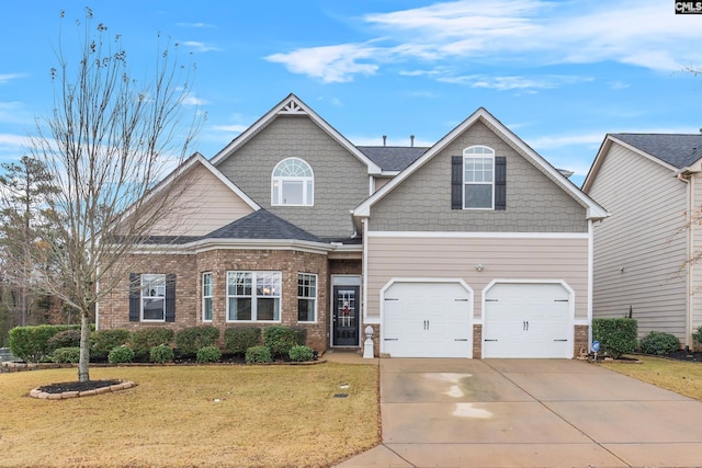 craftsman inspired home featuring a front lawn and a garage