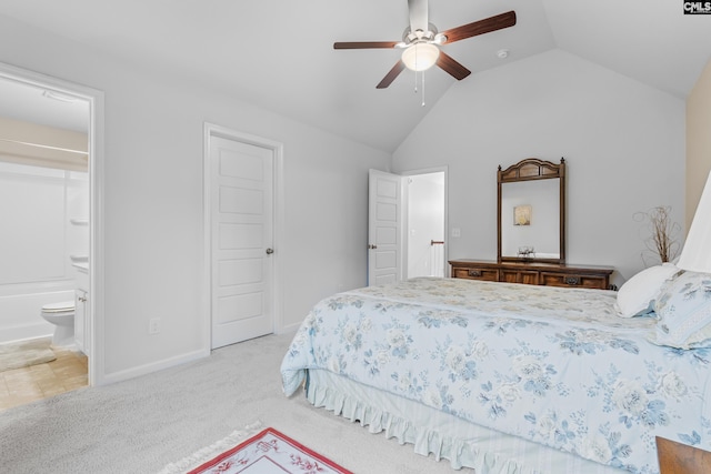 carpeted bedroom with ceiling fan, ensuite bath, lofted ceiling, and a closet