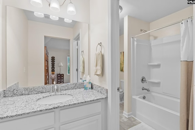 full bathroom featuring shower / bath combo, toilet, and vanity