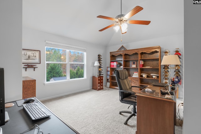 office area featuring ceiling fan, carpet floors, and vaulted ceiling