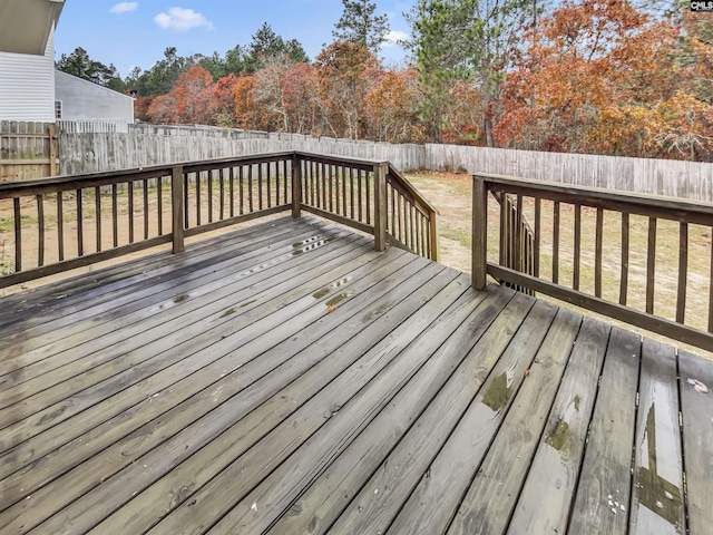 deck featuring a lawn