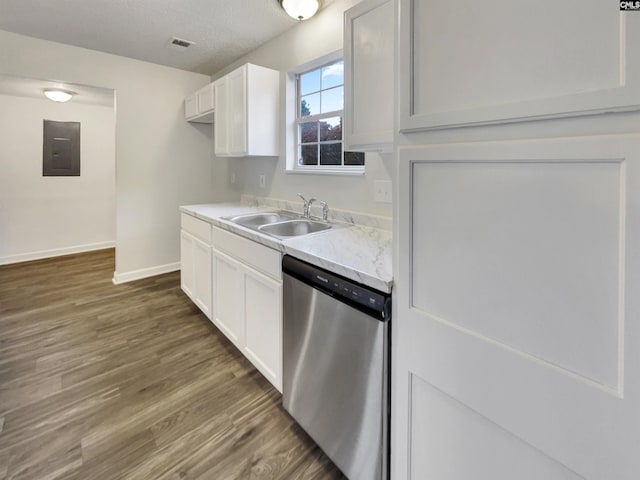 kitchen with dishwasher, sink, dark wood-type flooring, electric panel, and white cabinets