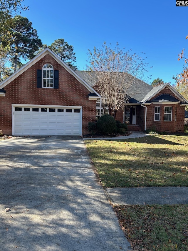 ranch-style home featuring a front yard