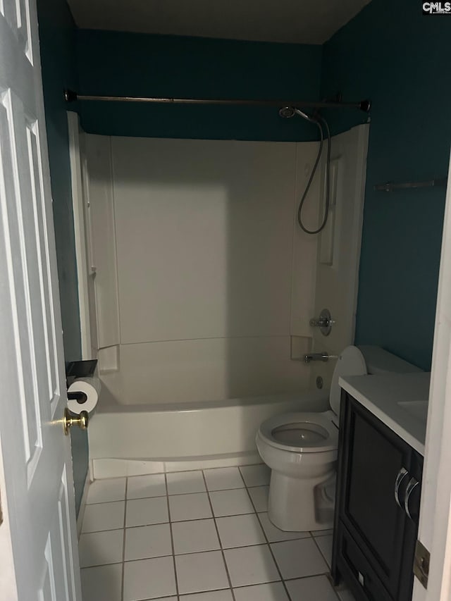 full bathroom featuring tile patterned flooring, vanity, shower / bath combination, and toilet