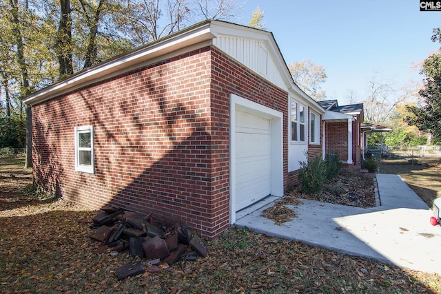 view of property exterior featuring a garage