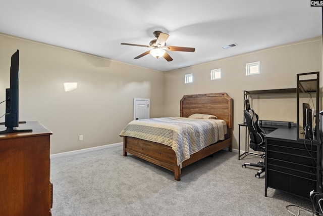 bedroom featuring ceiling fan and light colored carpet