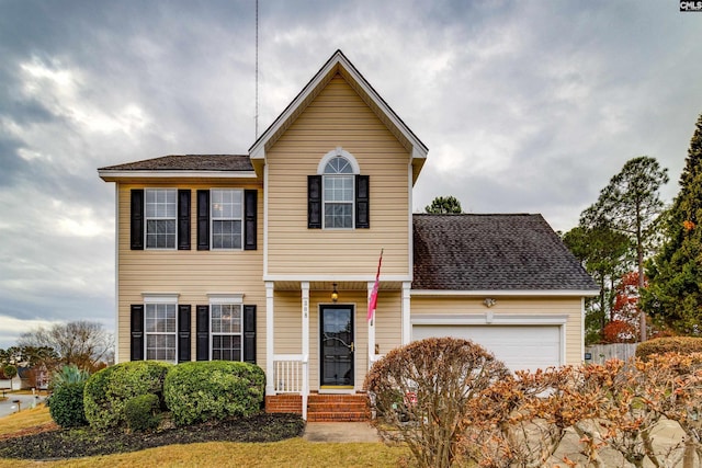 view of front of property with a garage