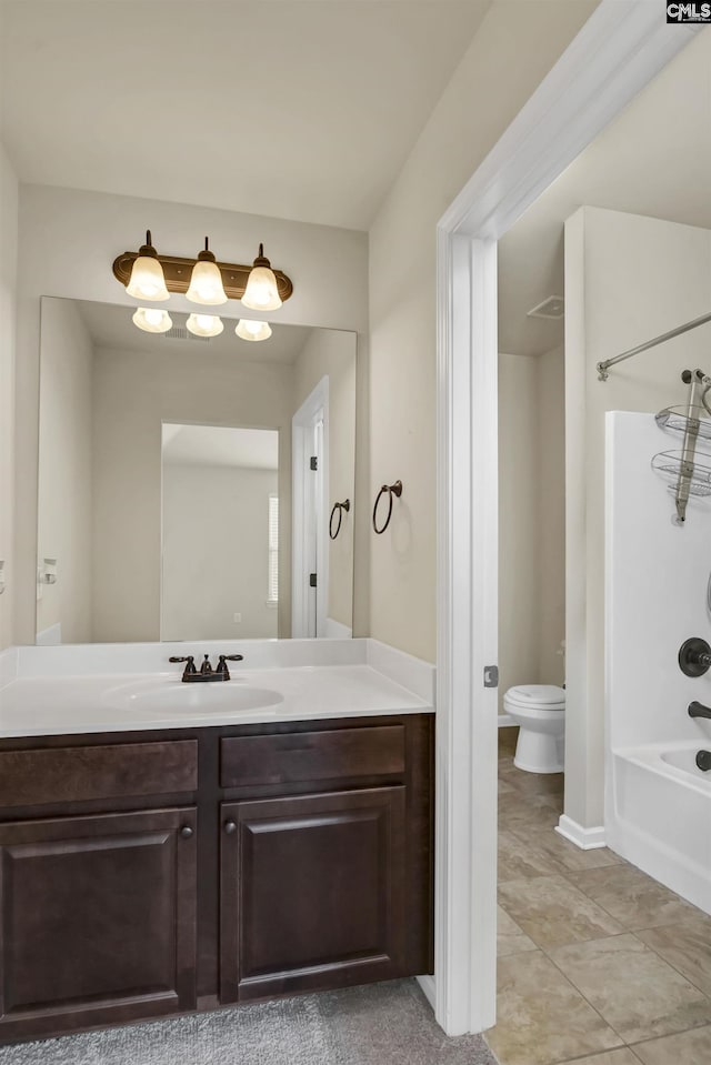 full bathroom with toilet, vanity, bathing tub / shower combination, and tile patterned flooring