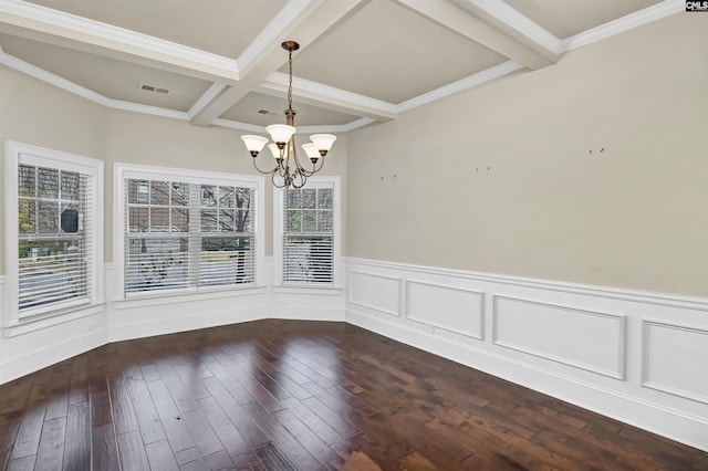 unfurnished dining area with a notable chandelier, beam ceiling, crown molding, and dark wood-type flooring