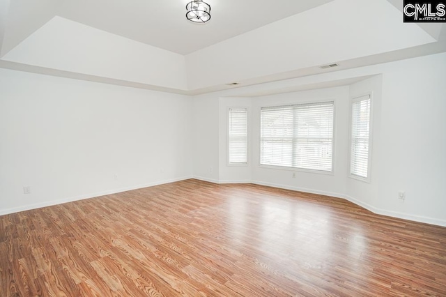 spare room with light wood-type flooring