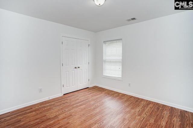 empty room with light wood-type flooring