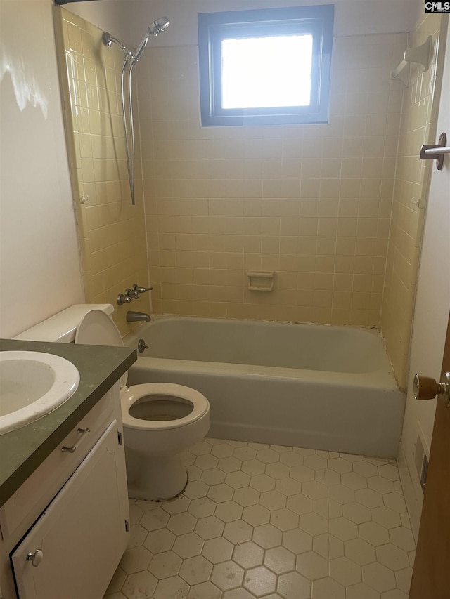 bathroom featuring shower / washtub combination, visible vents, vanity, and toilet