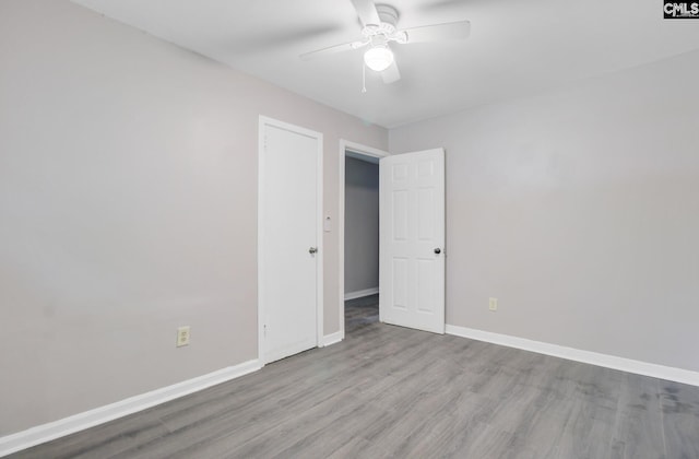 2432 Falcon Rd, North Charleston, SC 29406 - empty room with ceiling fan, wood finished floors, and baseboards