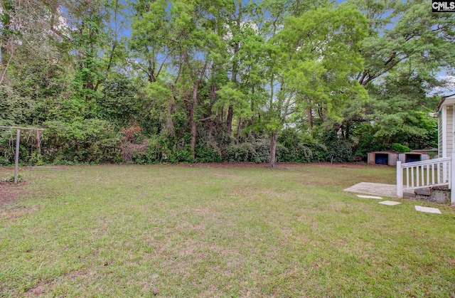 2432 Falcon Rd, North Charleston, SC 29406 - view of yard featuring an outdoor structure and a shed