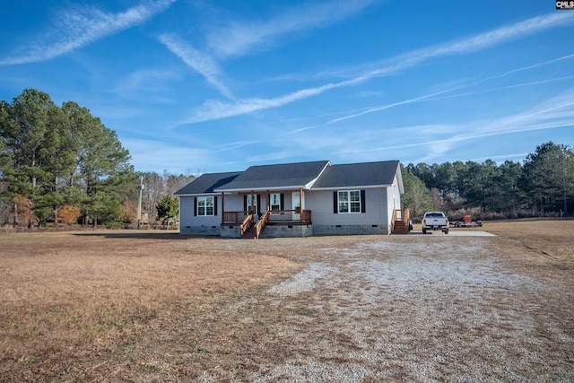 single story home featuring covered porch