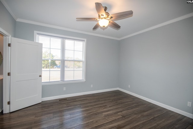 empty room with dark hardwood / wood-style flooring, ceiling fan, and ornamental molding