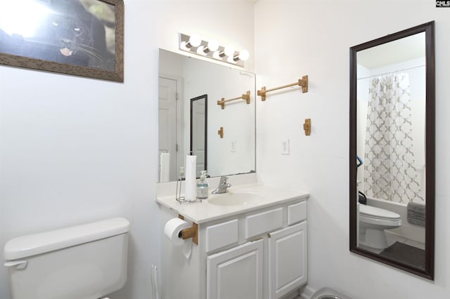 full bathroom featuring vanity, toilet, and shower / tub combo