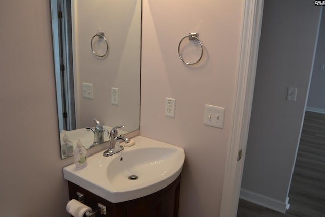 bathroom featuring hardwood / wood-style floors and sink