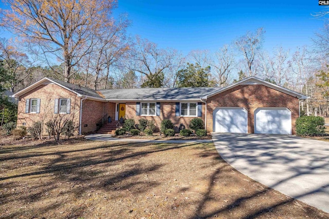 ranch-style home featuring a garage