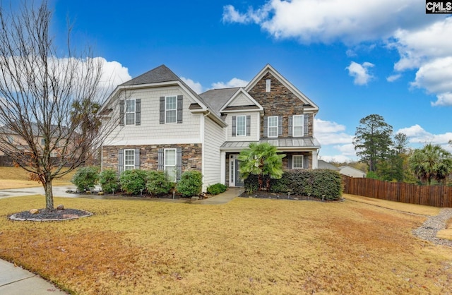 view of front of home featuring a front yard