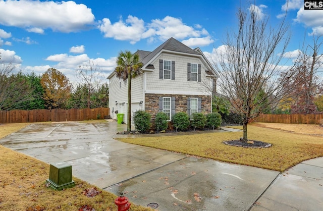 exterior space with a lawn and a garage